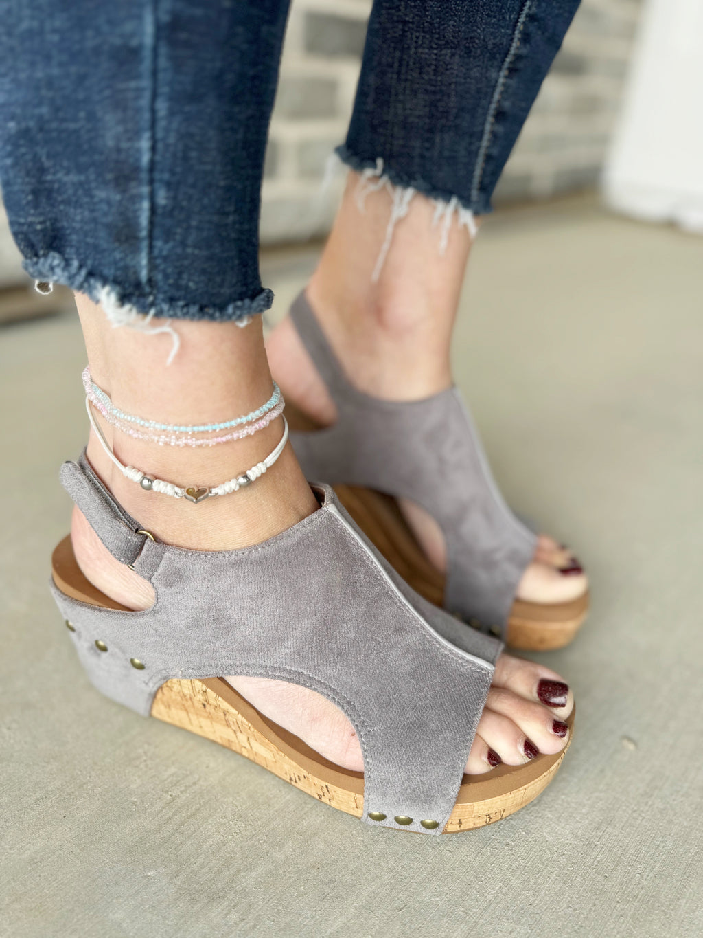 Corky’s Carley Faux Suede Sandals in Light Gray