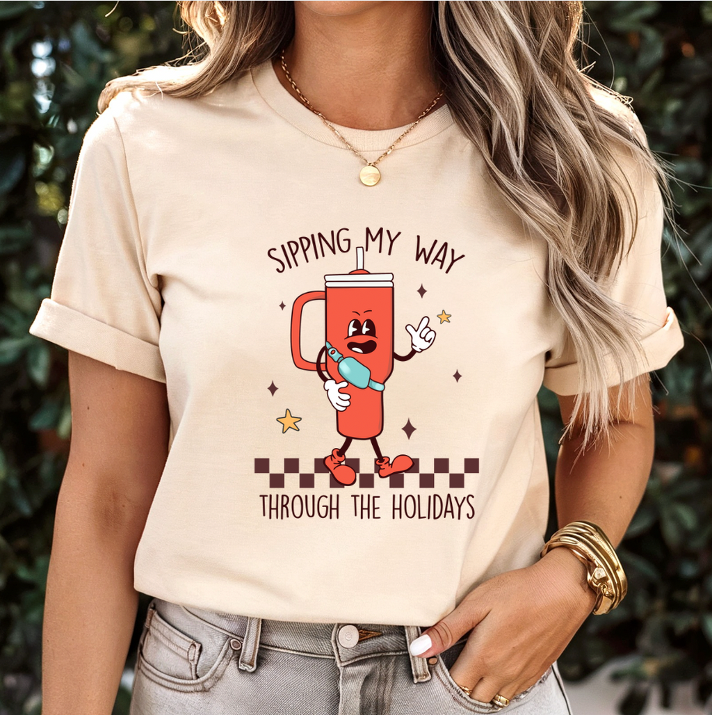 Sippin' My Way Through The Holidays Graphic Tee